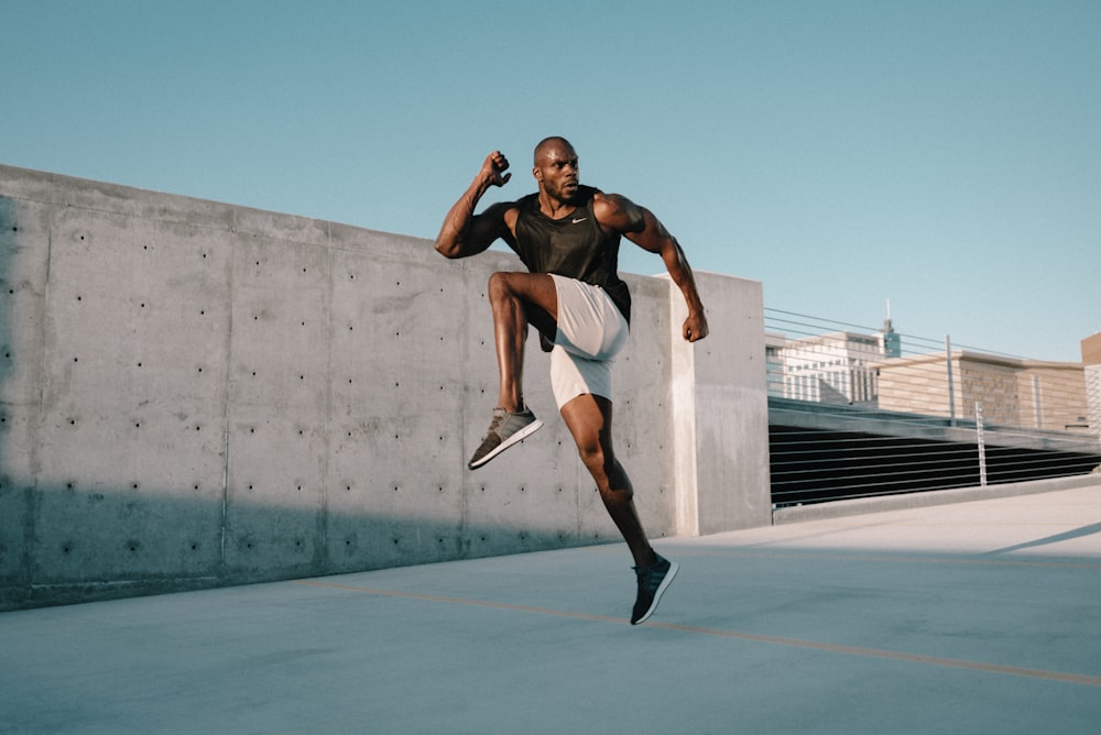 A man practicing stair climbing as a functional exercise for improved lung health and leg strength.