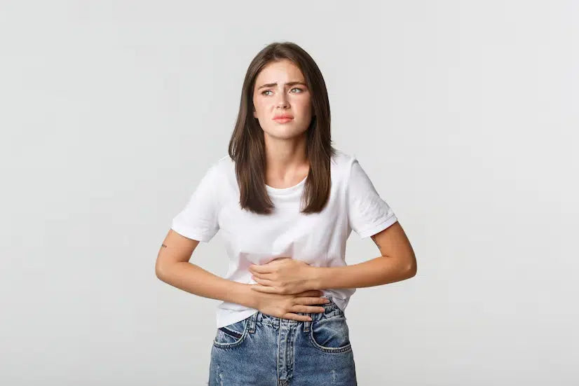 A diagram illustrating common lifestyle factors that negatively impact the harmony of the gut microbiome.