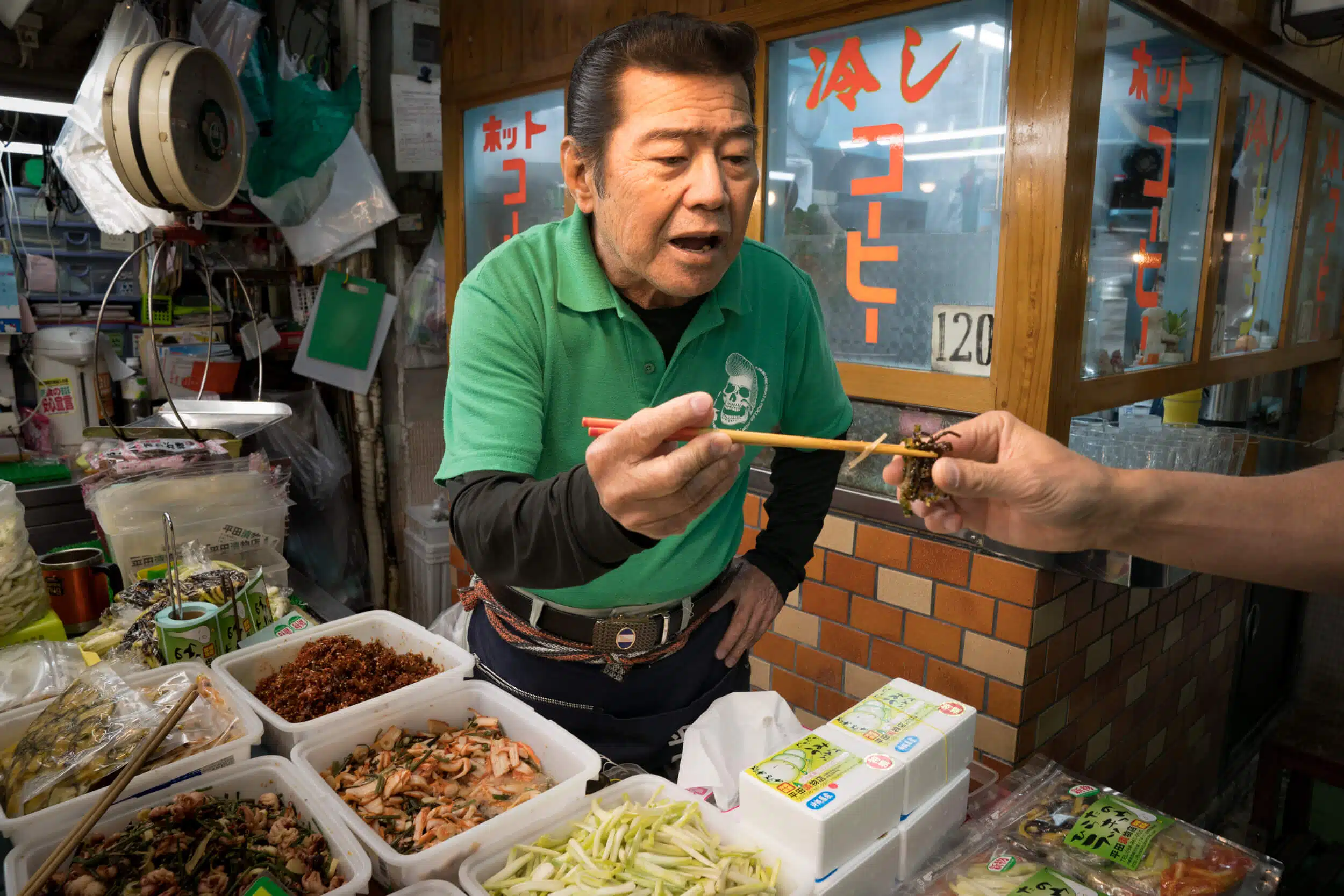 A traditional cooking scene in Okinawa featuring fresh local ingredients.