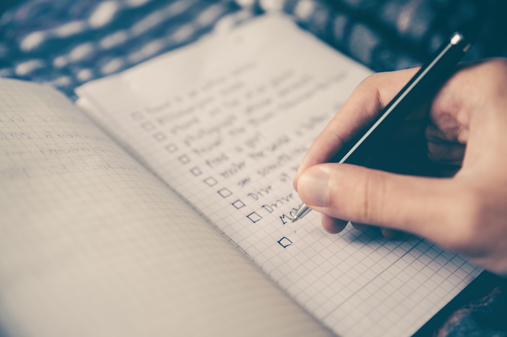 Close-up of a handwritten daily planner showing a balance of activities and rest periods.