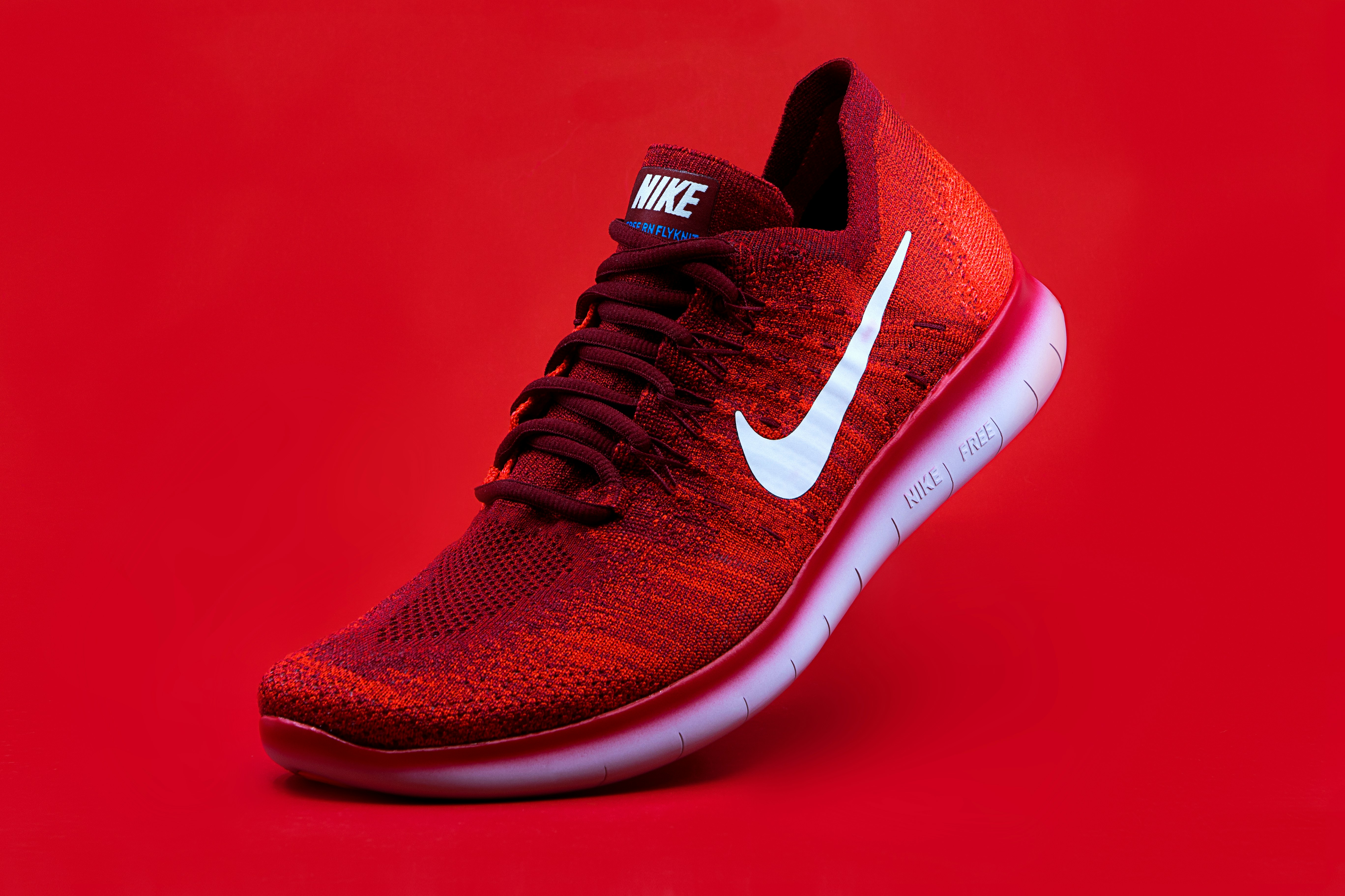 A pair of high-quality running shoes with laces tied, ready for a workout.
