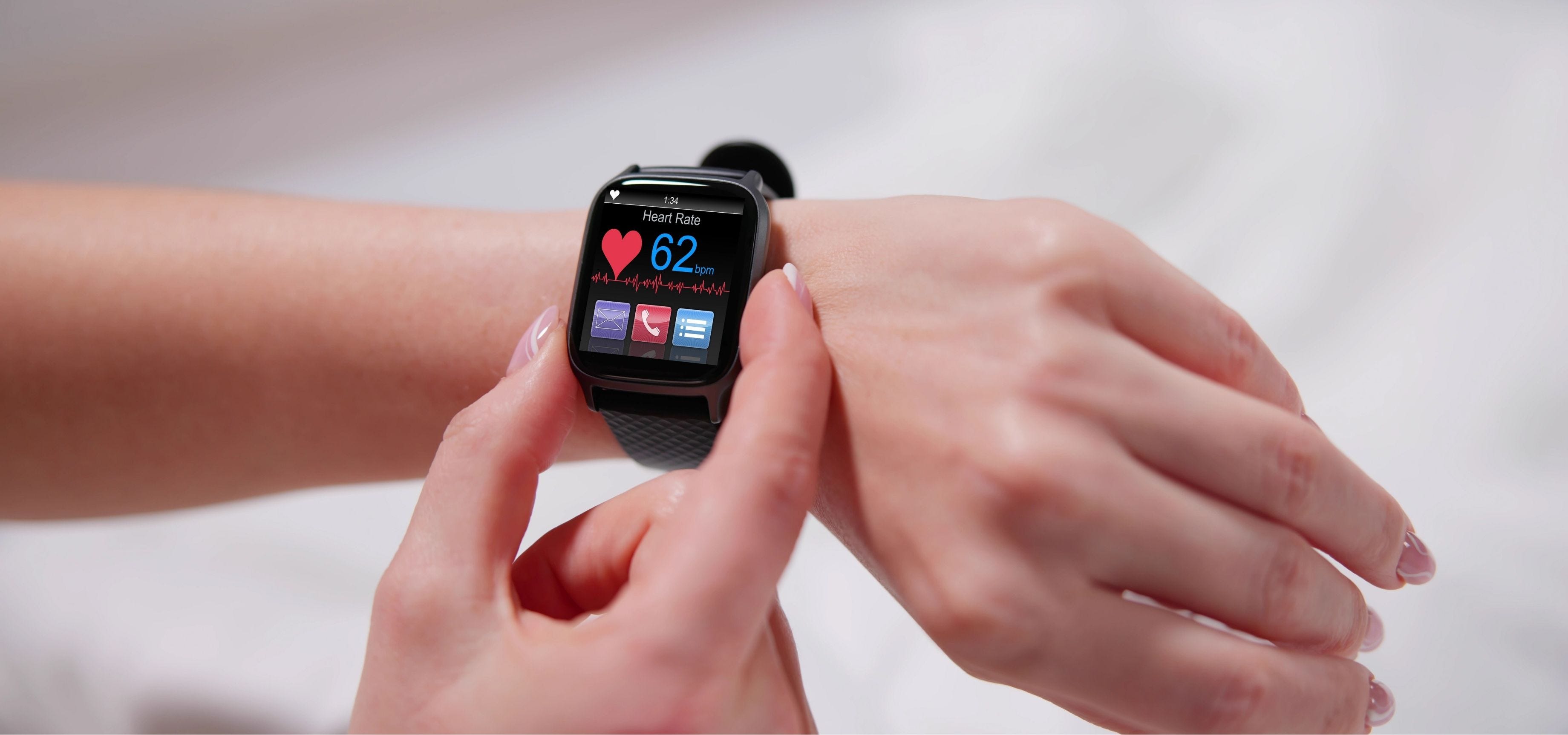 A person reviewing sleep data and REM cycle metrics on a modern smartwatch.