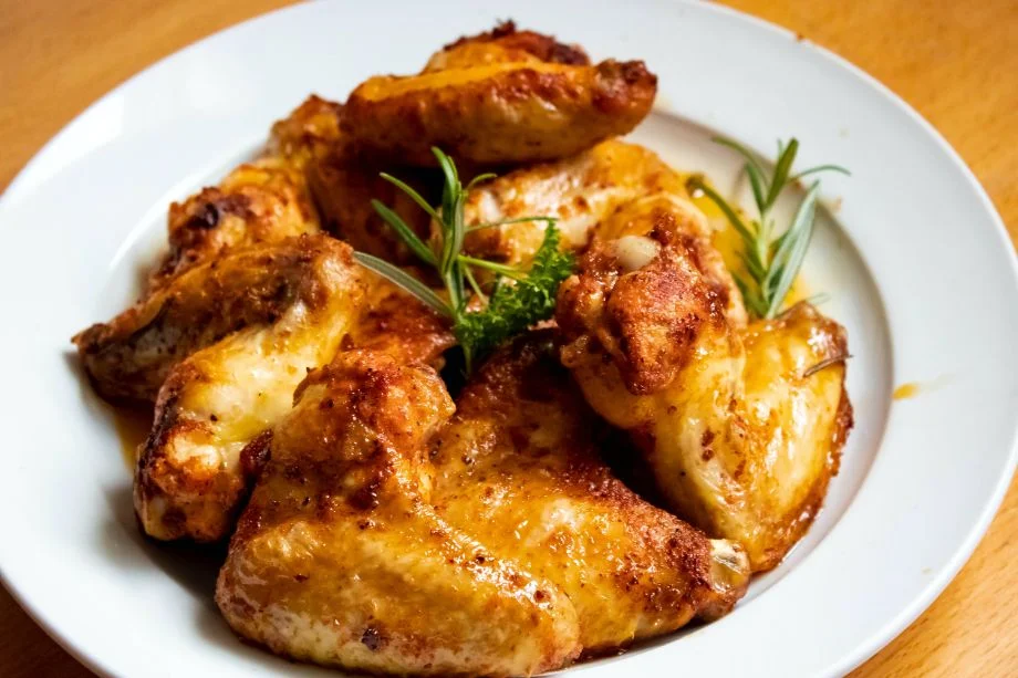 A cooked, sliced chicken breast served on a plate.