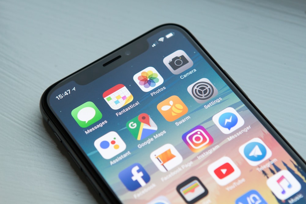 An iPhone screen displaying the iOS 18.1 Health app hearing health interface.