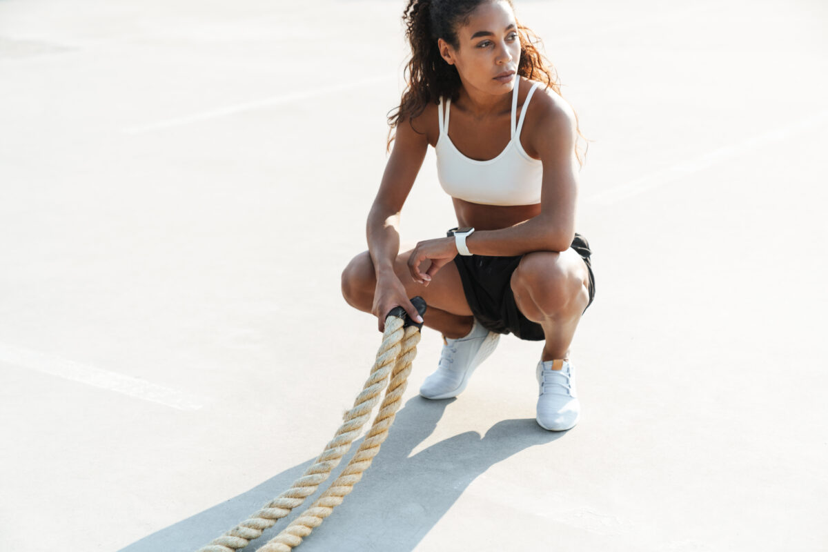 A split screen showing a person in deep sleep and an athlete beginning an early morning workout.