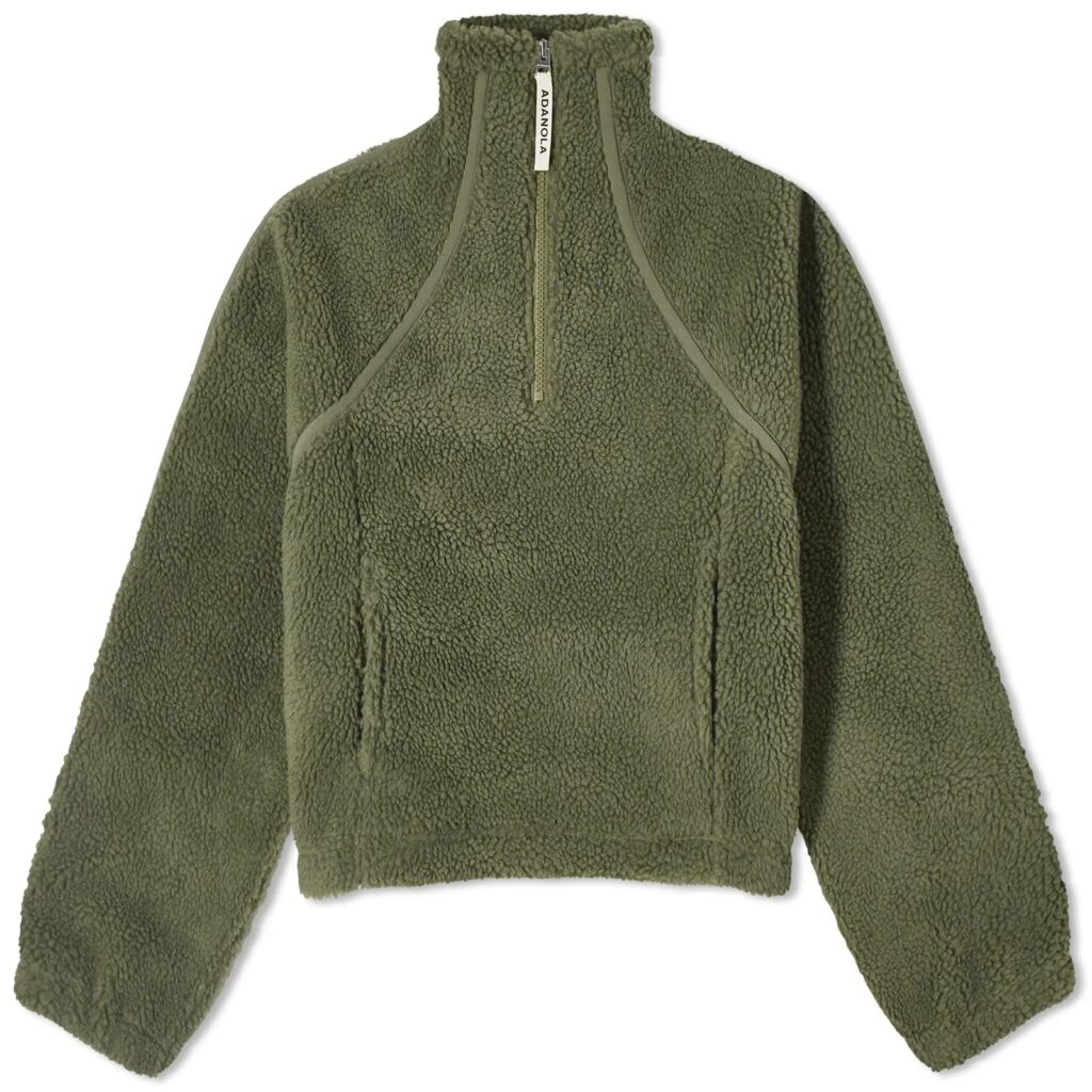 A khaki-colored quarter-zip fleece top for thermal layering in autumn.