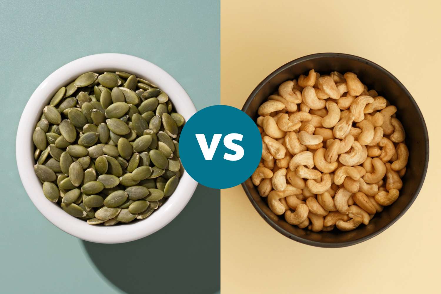 Two bowls, one containing green pumpkin seeds and the other containing whole cashews.