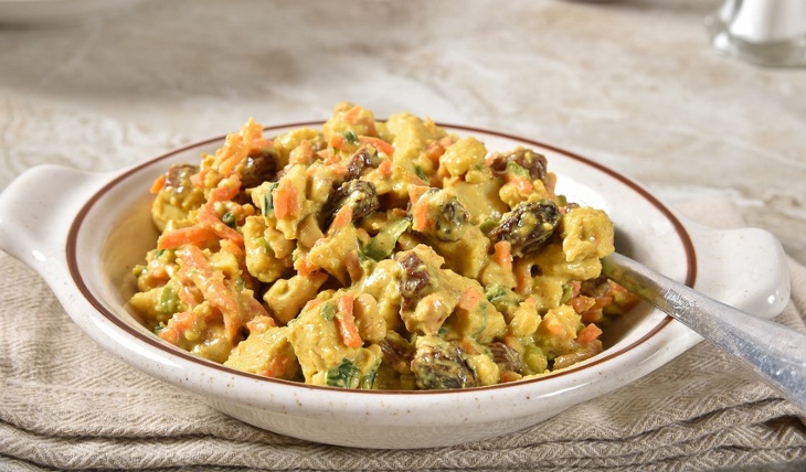 Curried chicken salad served as a high-protein snack.
