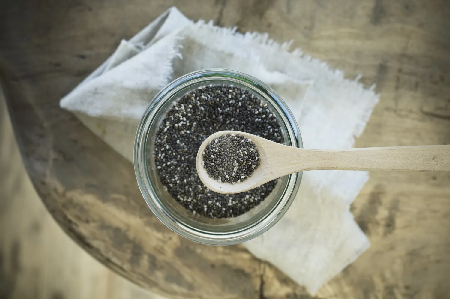 A spoon of chia seeds.